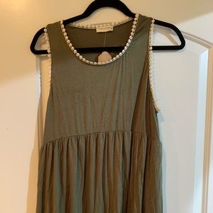 Cute army green tank top with detailing!